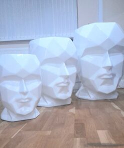 collection of talking heads fiberglass planters