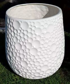 close up of the moon fiberglass planter in garden