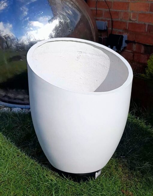 the epsilon fiberglass planter on grass