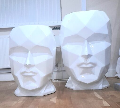 two talking heads fiberglass planters showing size and quality